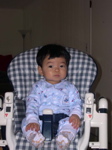 in his high chair
